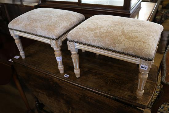 Pair of beech footstools with rectangular upholstered tops